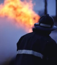 Firefighter Putting Out Fire - Burn Injury Lawyer - Burn Lawyer - Burn Victim Lawyer