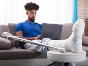 Man with Cast on Leg - Personal Injury Representation - Martin, Harding & Mazzotti 1800law1010