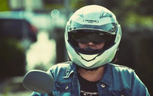 New York Motorcyclist wearing their helmet according to the laws