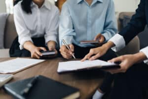 Dealing With Insurance - Harding Mazzotti, LLP - Young couple consultations with a insurance agent. saving and insurance concept.