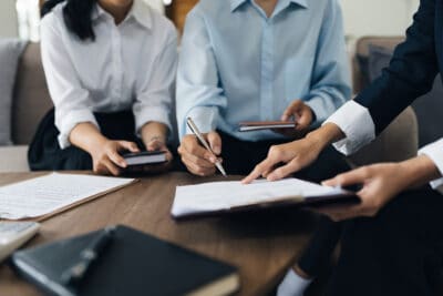 Dealing With Insurance - Harding Mazzotti, LLP - Young couple consultations with a insurance agent. saving and insurance concept.