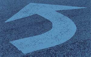 left turn car accident, left turn arrow on a street