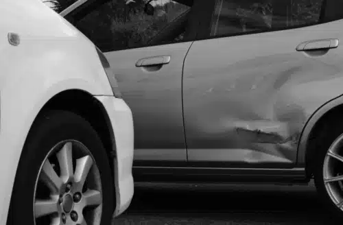 Closeup car crash with door damage